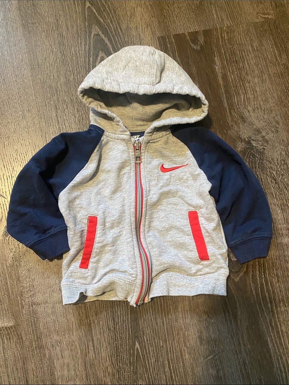 Nike Grey Hoodie with Navy Sleeves and Red Accents Size: 6-9M